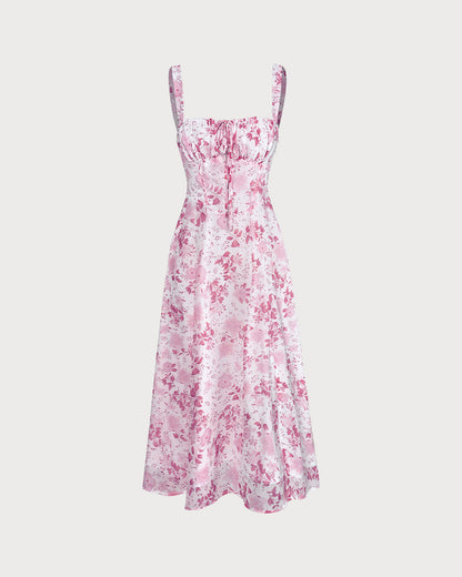 Das rosa Midikleid mit quadratischem Ausschnitt, Blumenmuster und Rüschen